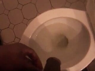 Black cock taking a piss