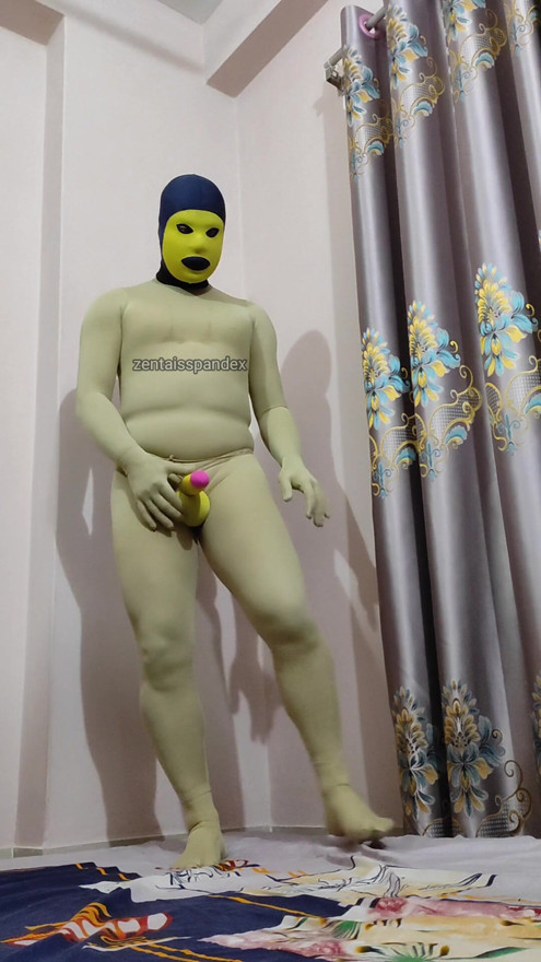 Zentai BTS photo shooting behind penis enlargement