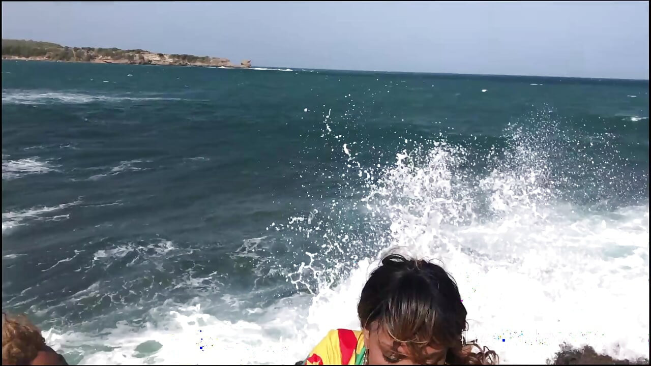 Ebony girls lick pussy on beach