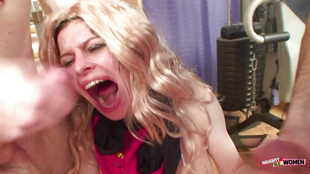An gorgeous young lady performs oral sex on two enormous penises before parting her legs and having sexual relations, causing an