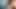 naked in front of the camera, he exposes his ass