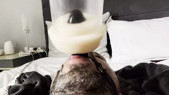 Face fucked by milking machine
