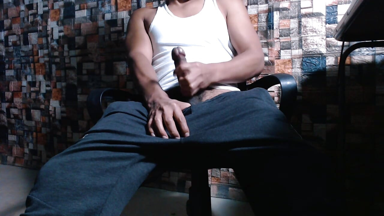 Solo male in athletic wear reaching orgasm