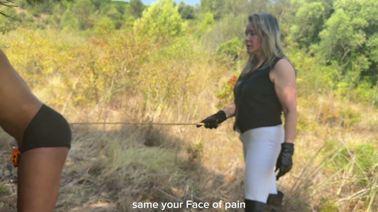 EmpressBellaSadica punishing slave tied up in the forest