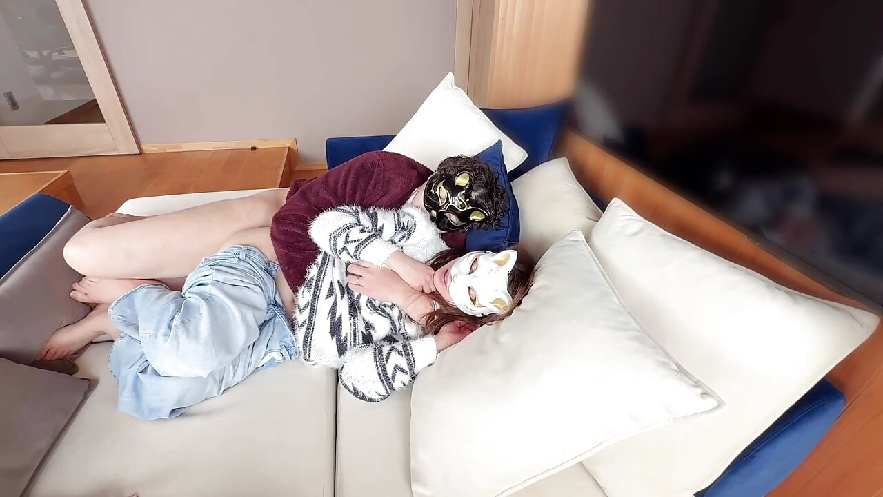 On the Sofa in Their Secret Room, They Shared Passionate Kisses Before Making Love, Expressing Their Deep Love.