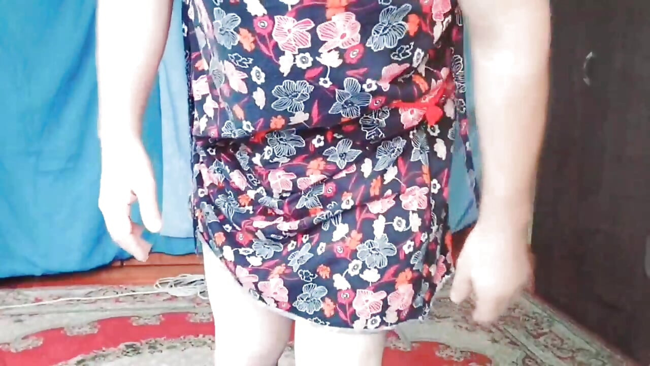 Playful trans girl trying on cute summer dress
