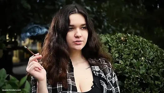 Sweet and Busty Russian Babe Smoking Cigarette in Nature