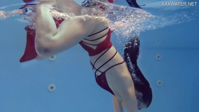 Marfa is a cute Russian pornstar who gets naked in the pool