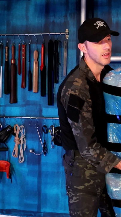 Twink Slave Bound in Pallet Wrap for Orgasm Control