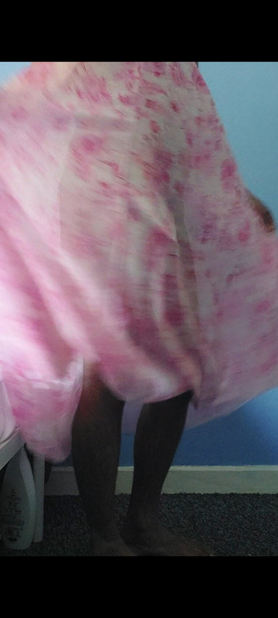 Shemale in a Silky seethrough floral fleared chiffon skirt