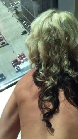 Fucking his wife in the high floor of building