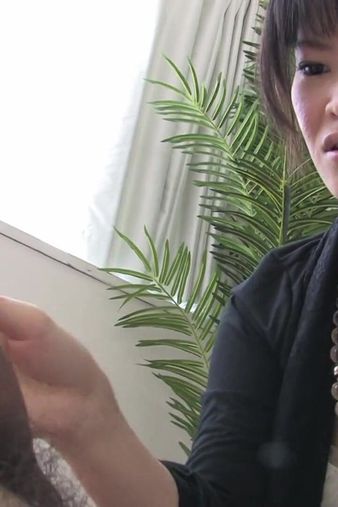 Adorable Japanese cutie enjoys sucking her lover's dong