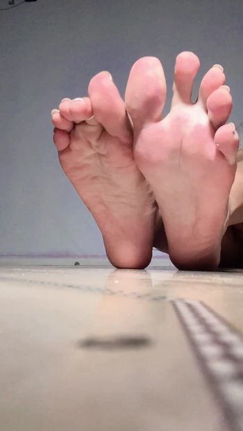 Your cock throbs through my sexy soles.