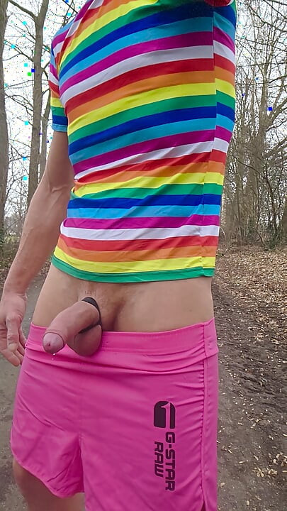 Skinny twink shows his thick cock outdoors and can be watched pissing. Hard cock pisses on the street.