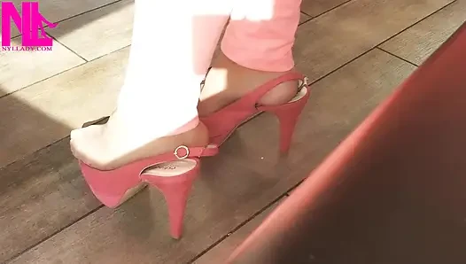 Shoeplay with High Heels in a Bar