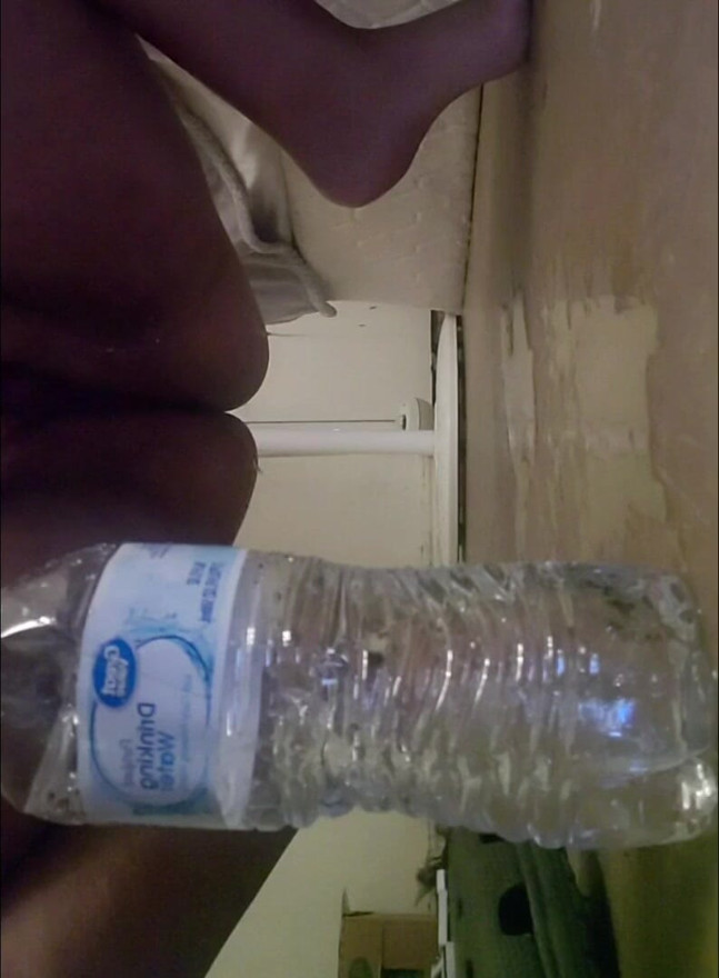Slut pissing on the floor