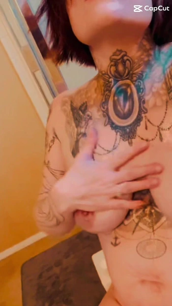 Sexy Preggo MILF oils up her huge tits