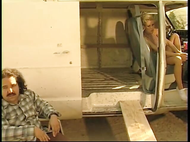 Two guys watch a slutty blond get fucked in her pussy by a machine