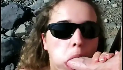 Curly-Haired teen sucks older guy's cock at the beach then fucks