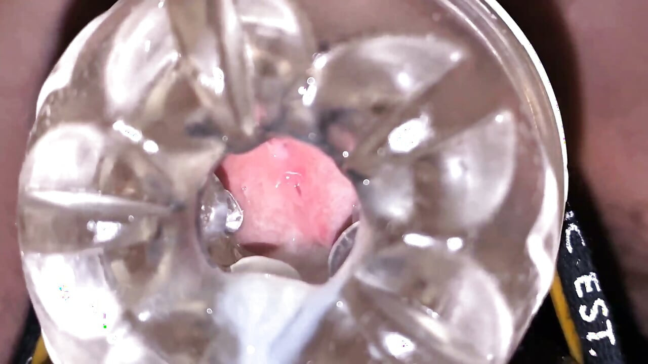 Close-up Cock in Tool for Masturbate Orgasm on Flash