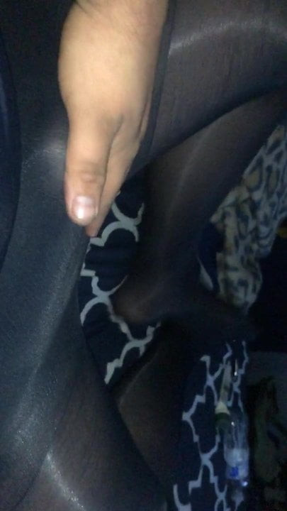 Playing around in two pairs of navy blue pantyhose