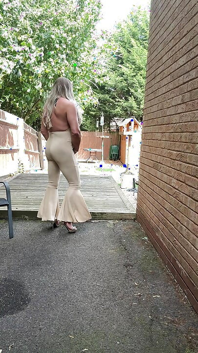 Sexy Crossdresser kellycd2022 in gold stretchy catsuit and heels