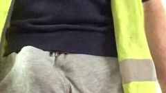 Scally builder's bulge in grey sweatpants and hi vis
