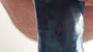 Jerking off with blue condom