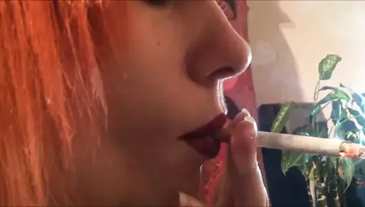 Redhead smoking close up