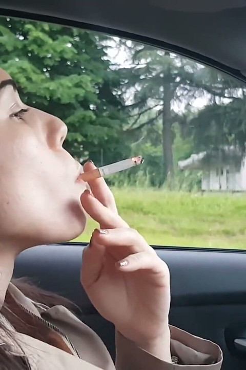 Petra loves to smoke ciggaretes in her car