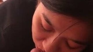 Chinese girlfriend gives a blowjob