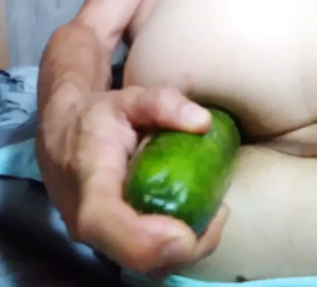 Anal playing with massive cucumber