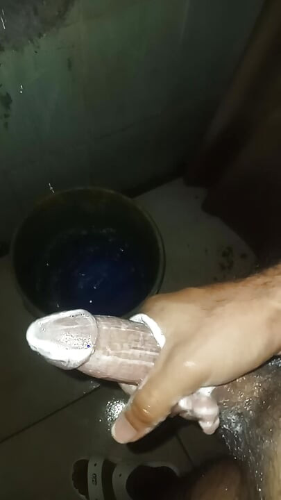 Slim man grabs his penis as a toy and starts masturbating all the time he was in the bathroom while they were not at home alone