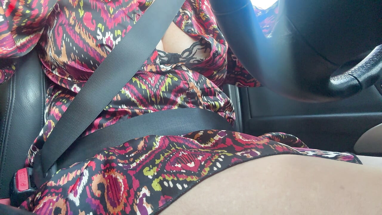 Sexy stepmom drives home and teases us with her big tits, which are practically popping out of her bra.