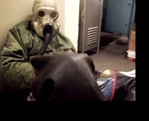 skinhead wanking in a rubbertube