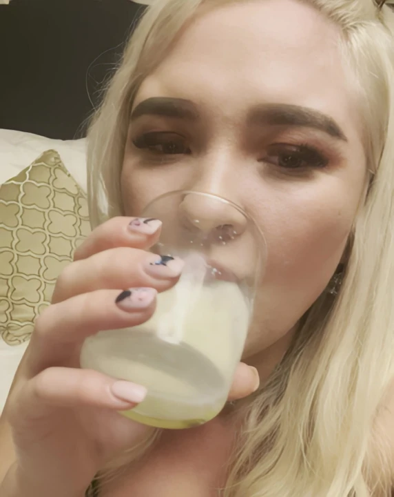 Karina drinks a glass of fresh.