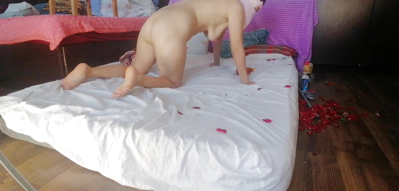 Foreplay in the bedroom with an amateur couple.