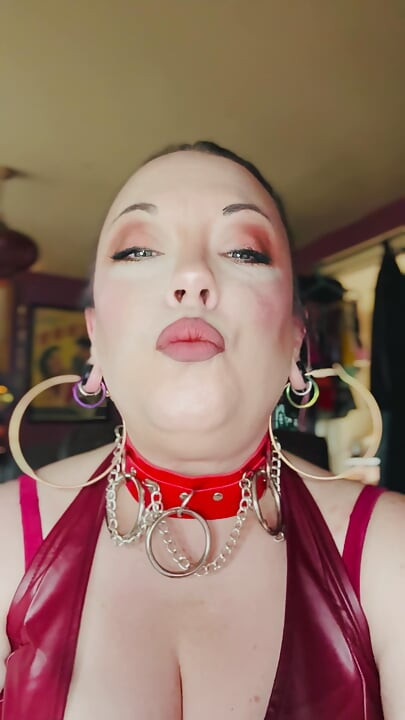 Leather Clad Tina Snua Smoking A Cigarette With Lots Of Dangles