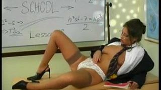 Horny Teacher Rubs Her Pussy On The Desk
