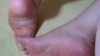 Le dita dei piedi e delle suole del giapponese Yum Yum