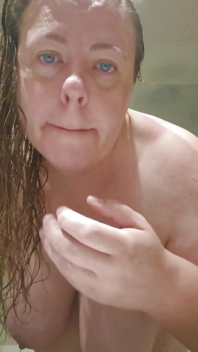 Curvy MILF Takes Shower Flashing All