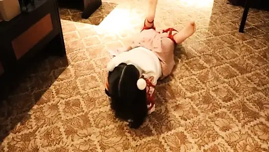 A Cute Little Dressed in a Jk Uniform Was Walking Around Barefoot on the Ground.