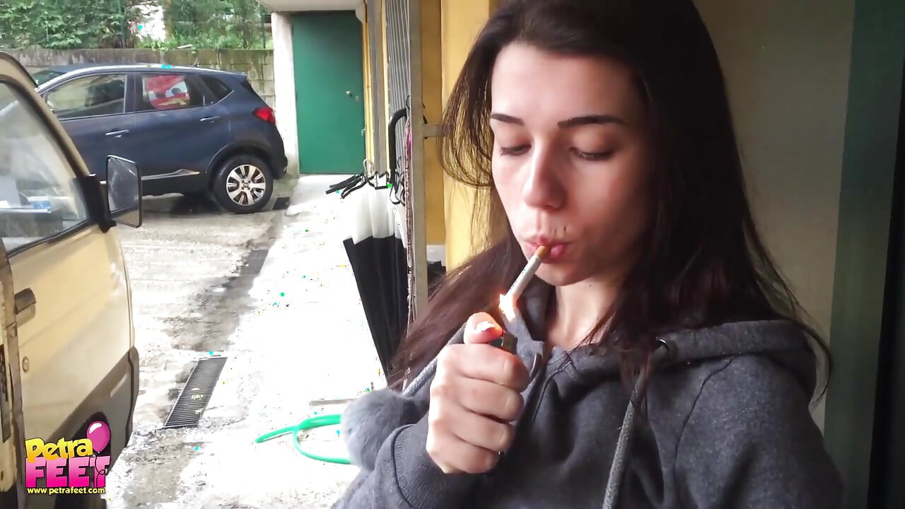 Outdoors smoking from the stunning brunette