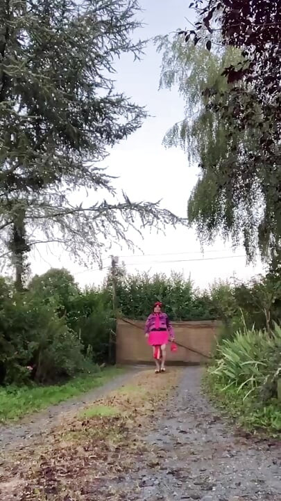 Dressed with a new pink skirt and the fuchsia tie stained with semen for a night out