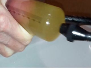 Kencing dan air mani di pompa penis saya