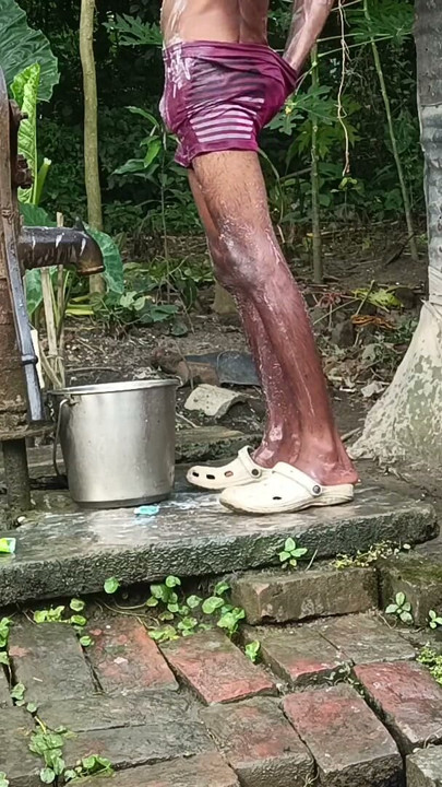 Black mature man bath in desi style. Showing big dick. | Clip 1
