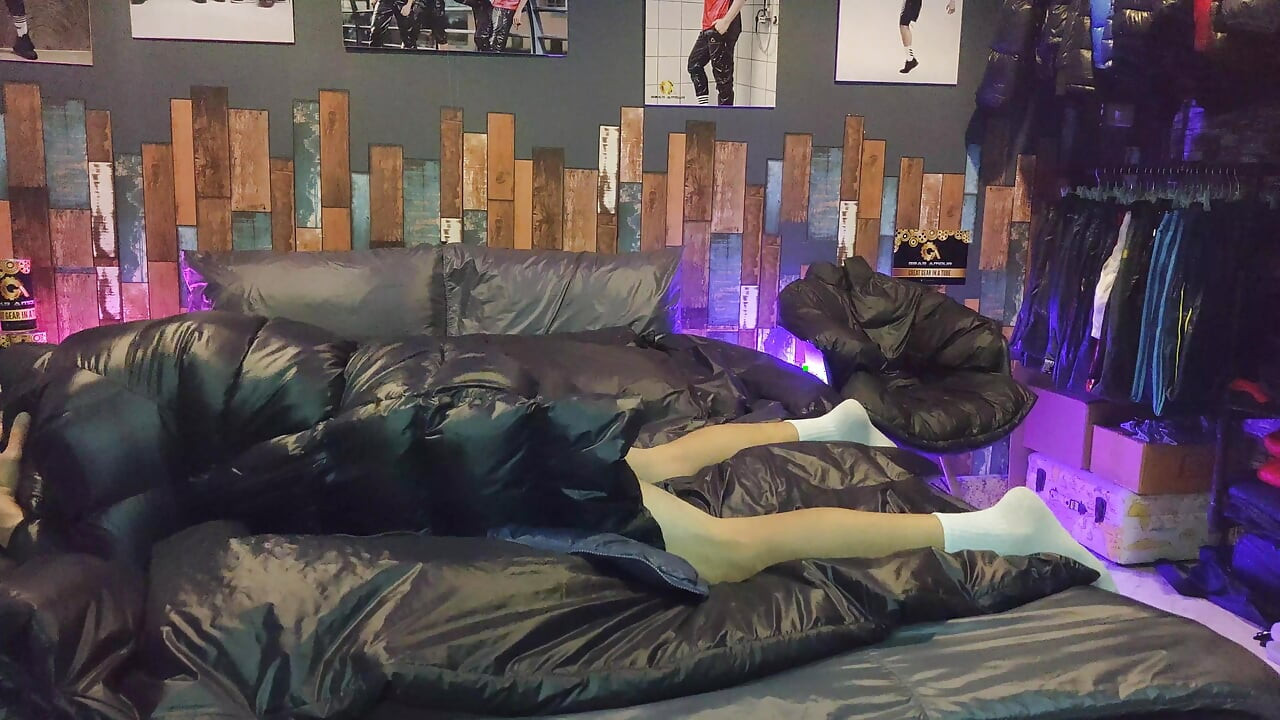Cock Rubbing Down Jacket on Shiny Nylon Bed