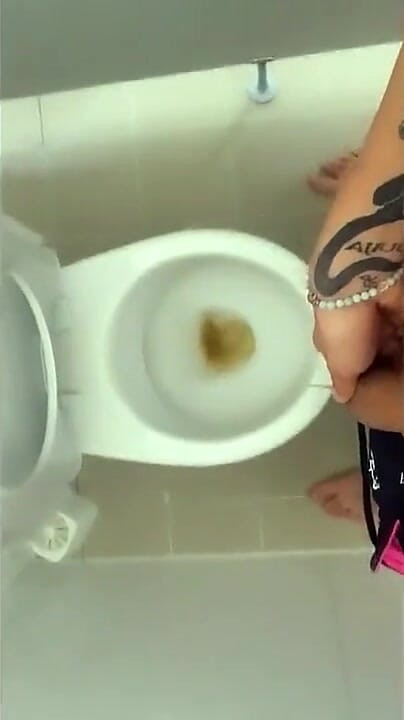 Tattooed Twink Is Pissing in Waterpark Piss Filled Toilet
