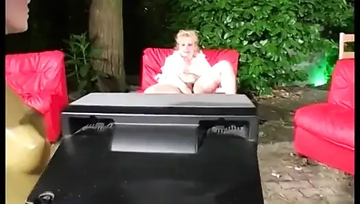 Mature blonde fingering her pussy and sucking a hard cock