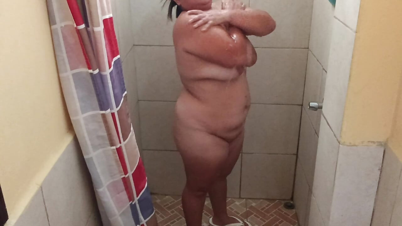Taking a shower in a public restroom.